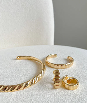 ARGOLA TORCELLY BANHADO A OURO 18K